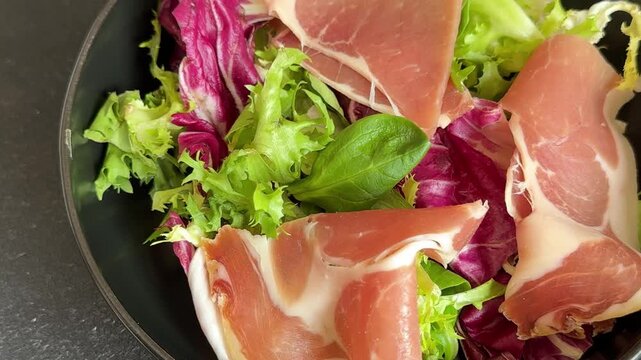 salad jamon meat mixed green salad leaves meat dish tasty snack fresh, delicious, gourmet food background rustic food on the table, top view, copy space