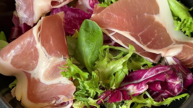 salad jamon meat mixed green salad leaves meat dish tasty snack fresh, delicious, gourmet food background rustic food on the table, top view, copy space