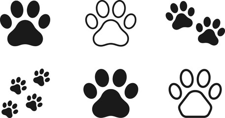 Fototapeta premium Collection of simple black and white animal paw print icons designed as a minimalist vector illustration for use in pet graphic projects