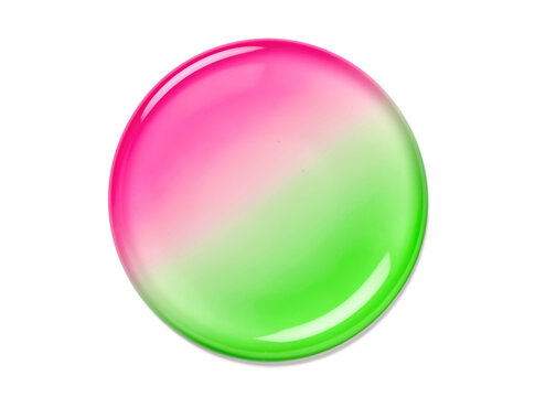 A single green and pink button resting on a clean white background