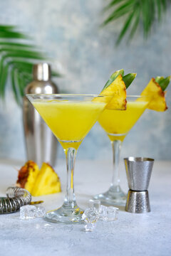 Pineapple cosmopolitan cocktail in a glasses.