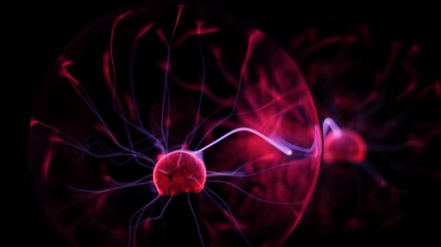 Dynamic plasma ball discharge with blue and purple neon lightning in motion