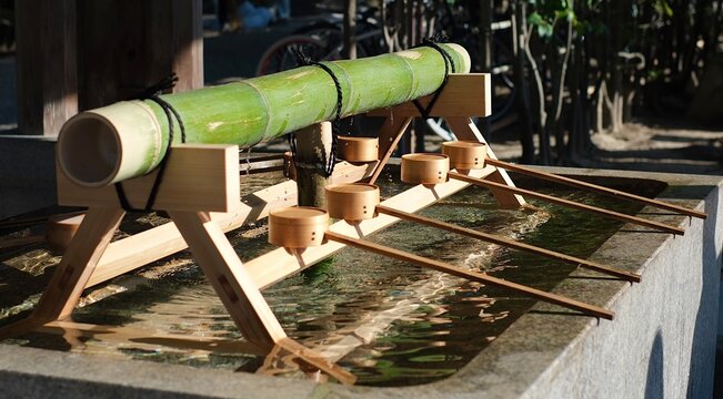 Traditional purification basin at Japanese shrine