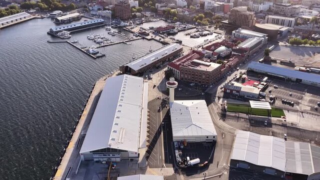 Aerial lift to Mt Wellington over Hobart city Sullivan&rsquo;s cove marina in Tasmania &ndash; Australia.