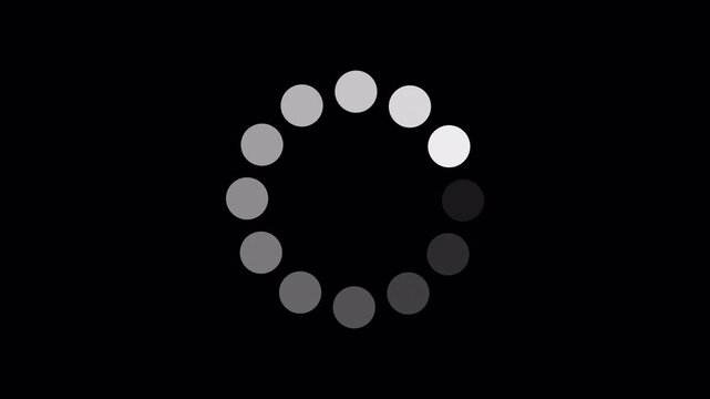 Loading Circle on black screen. Loading Animation. twelve animated dots fading in and out in sequence creating a rotating effect