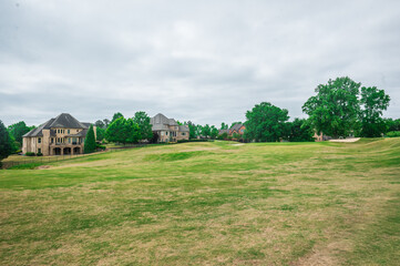 Fototapeta premium The rhythm of swings blends into the rhythm of nature, The Château Élan Golf Club, Braselton, Georgia, United States of America