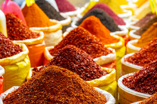 Mounds of Vibrant Spices at an Outdoor Antalya, Urfa, Gaziantep, Hatay Street Market . Various bright colored powder spices on market in Istanbul, Turkey. Turkish  colored spices at old bazaar  market