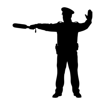 Silhouette of a police officer directing traffic with a baton.