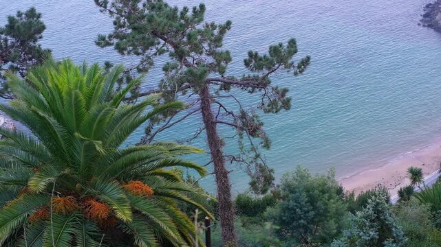 A breathtaking high-angle view of a secluded sandy beach in Lastres, Asturias