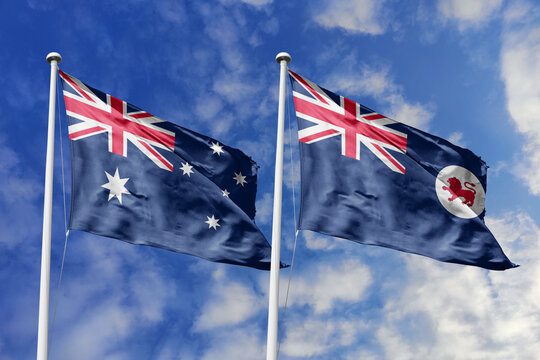 Australia and Tasmania flags waving in a clear blue sky symbolizing a powerful diplomacy a strategic partnership, and a shared vision of unity for a sustainable future.