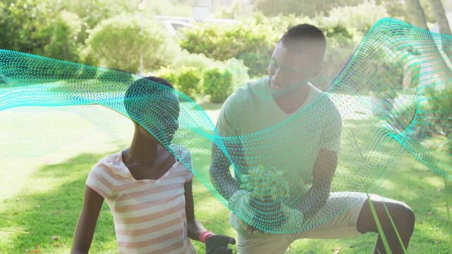 Man kneeling offering pot, woman putting pink gloves taking plant for gardening, teal mesh sweeping