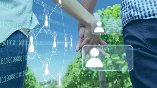 Couple joining hands walking vineyard, digital overlay entering and mapping users to hands