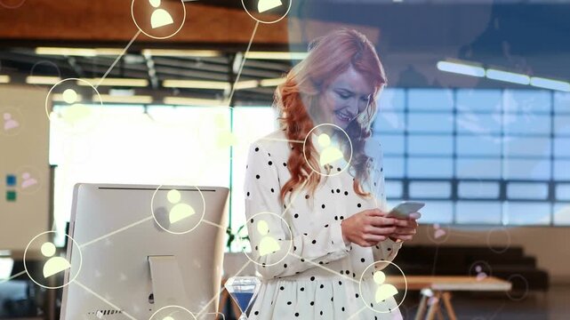 Woman holding phone and reading, causing network nodes overlay expanding across office for business