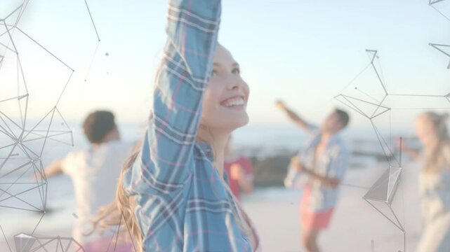 Woman lifting arm and spinning, starting wireframe tracking while friends dancing seaside marketing