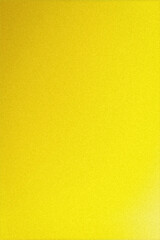 Fototapeta premium Vibrant yellow tones fade gently with fine grain detail, creating an energetic abstract backdrop perfect for modern branding, advertising, and upbeat digital designs.
