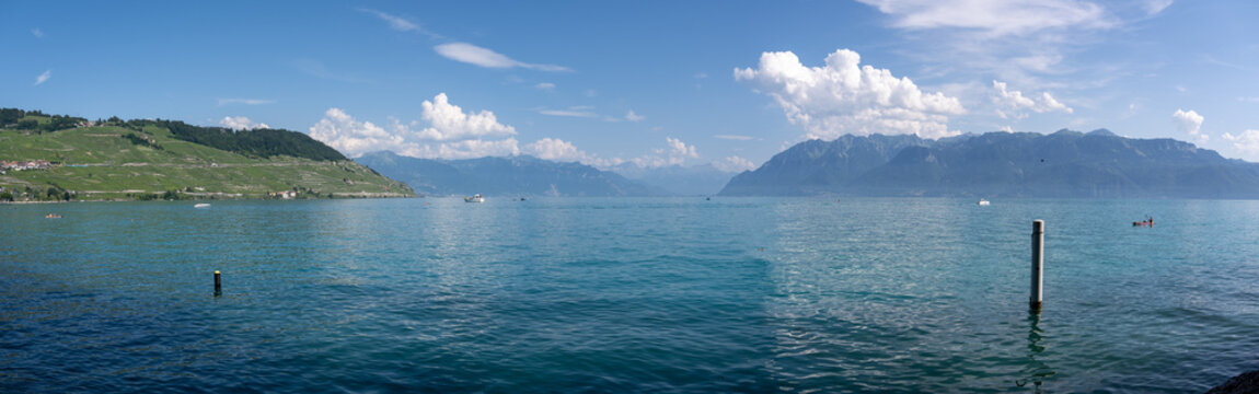 Panoramic Lake Geneva waters with Alps on the horizon