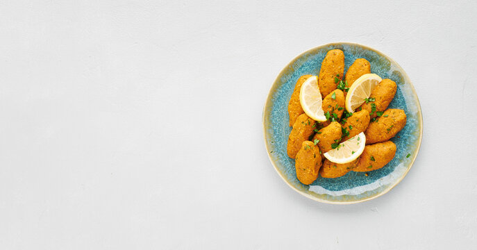 Turkish red lentil kofte, mercimek koftesi, top view, copy space