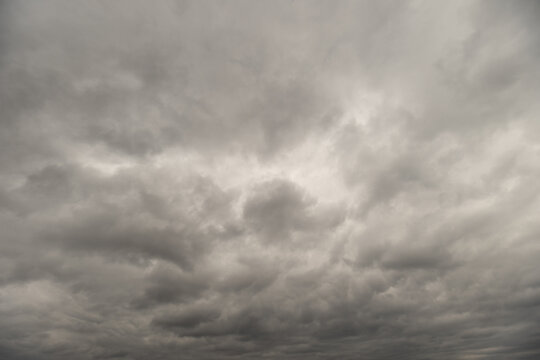 Overcast sky visuals. Dramatic layered cloud imagery. Rich textured sky with volumetric clouds. Atmospheric scene showcasing detailed cinematic cloud formations