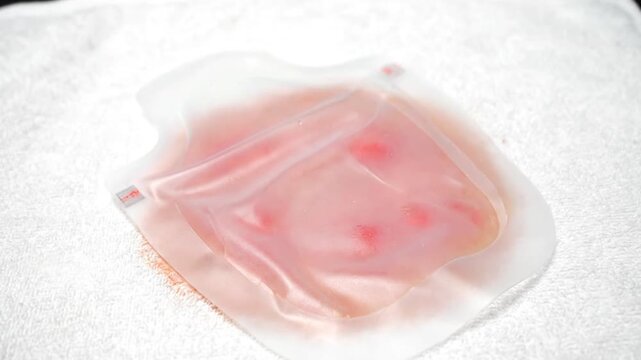 Transparent Medical Adhesive Dressing on Clean Towel for Wound Treatment and Healthcare Promotion