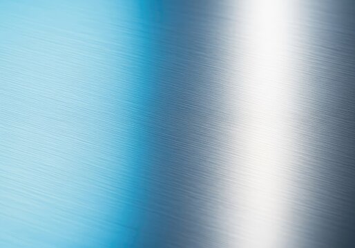 High-resolution macro shot of a brushed aluminum surface featuring smooth linear textures and a soft blue to silver light gradient effect, reflection, tech, metal