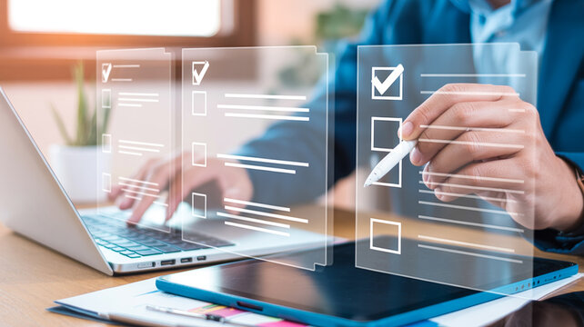 Businessman checking checklist on laptop, working on paperless document, e-signing, electronic signature, paperless office concept.