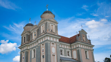Fototapeta premium Grand Baroque Church of St Thaddaeus in Luchay, Historic Belarus Architecture with copy space