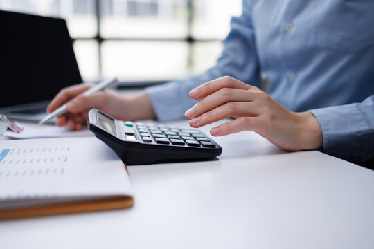 Using calculator calculating budget. Finance calculating tax. Money cost planning. accounting appraisal cost. Bank loan account. Analytics salary cash flow statement. Financial economy. Money savings.