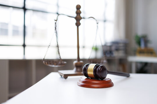 Gavel and scales representing justice and legal system