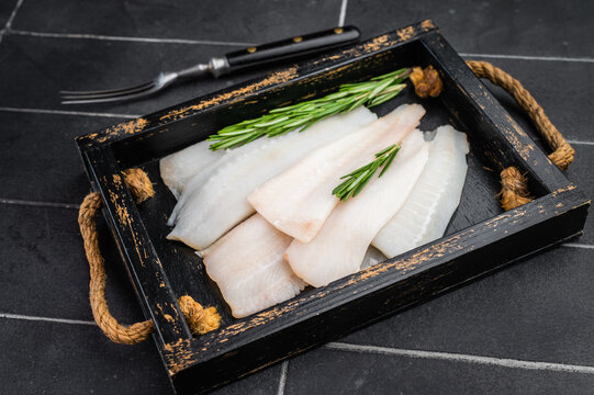 Raw white fish fillet slices