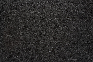 Fototapeta premium Dark black rough wall textured background wall