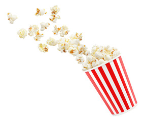 Popcorn flying out of striped cinema bucket, isolated on cutout transparent background © Yeti Studio