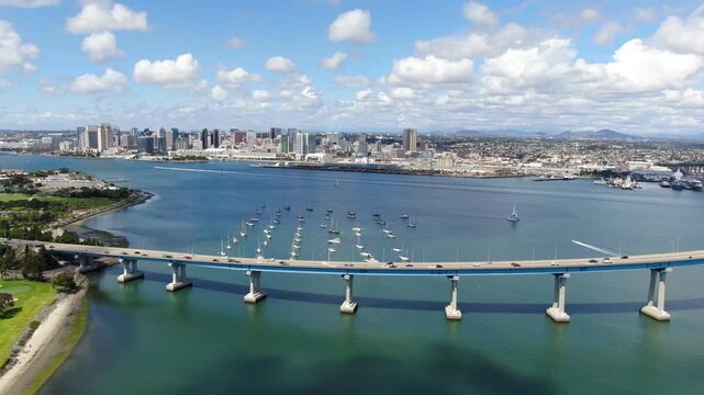 Aerial Wide Tracking Shot Of Coronado Bridge And San Diego Skyline