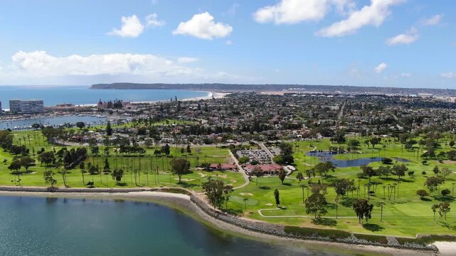 Aerial View Of Coronado Golf Course With Downtown San Diego Skyline Background