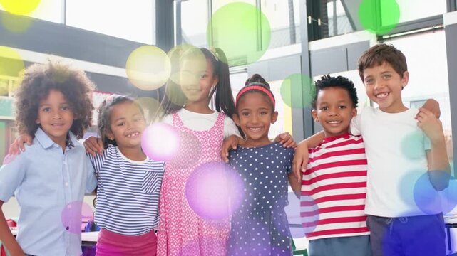 Six children holding pose classroom while bokeh overlays drifting, revealing faces for education