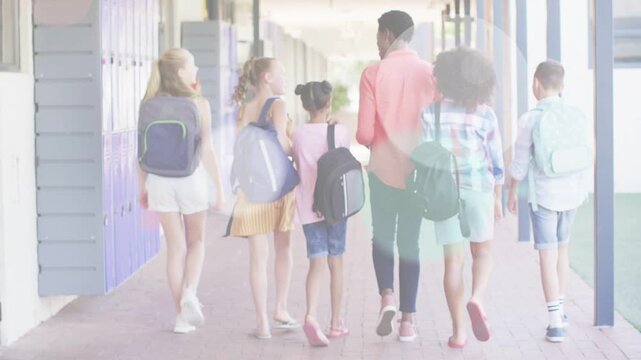 Adult woman leading children walking school hall, steps sparking colorful dots pulsing toward exit