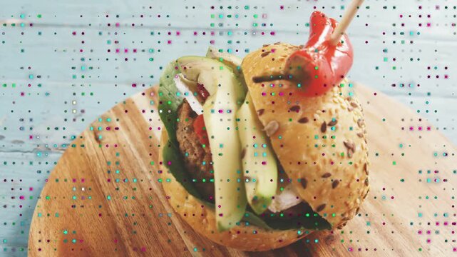 On play camera framing rotating tilting slowly to reveal seeded-bun burger right side and board arc