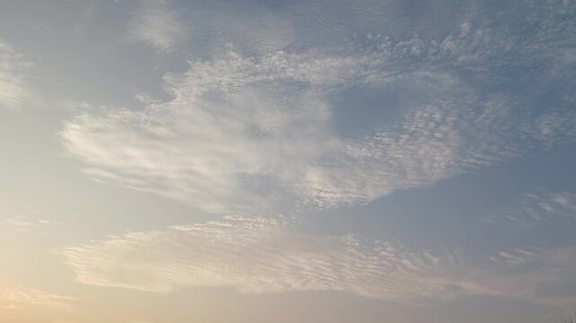 Beautiful blue sky with soft clouds
