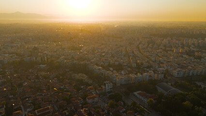 Fototapeta premium Antalya, Turkey. Aerial drone view showing historic Kaleici district, Kecili Park green space and modern city development in morning light.. Aerial View