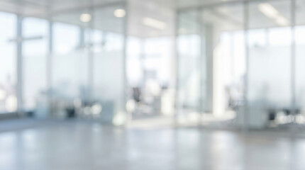 bright abstract defocused interior of modern contemporary corporate office building featuring glass partition walls empty desks and natural sunlight creating clean business background © Celt Studio