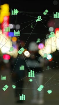 Vertical video: Network popping, green finance icons shifting as two walkers moving, showing data