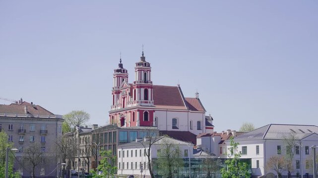 Saints Philip and James Church in Vilnius, Lithuania with Modern City Surroundings