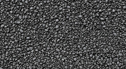 Fototapeta premium Close up macro shot of dark gray small pebbles texture background.