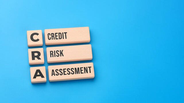 Credit risk assessment concept with wooden blocks and CRA abbreviation