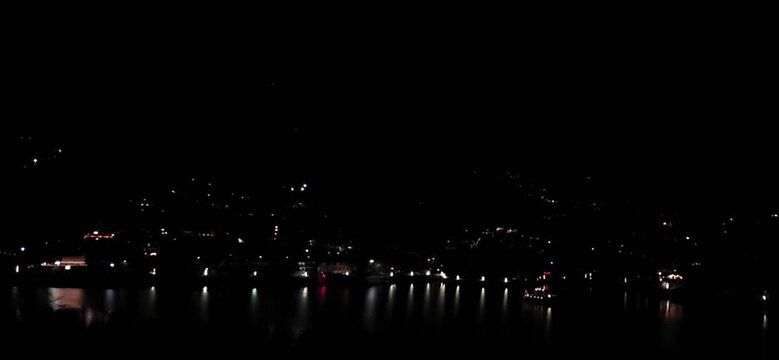 Distant Lights Across Dark Lake