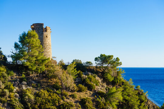 Coastal view with Pine tower on cliffs of Maro Cerro Gordo in Andalusia Spain