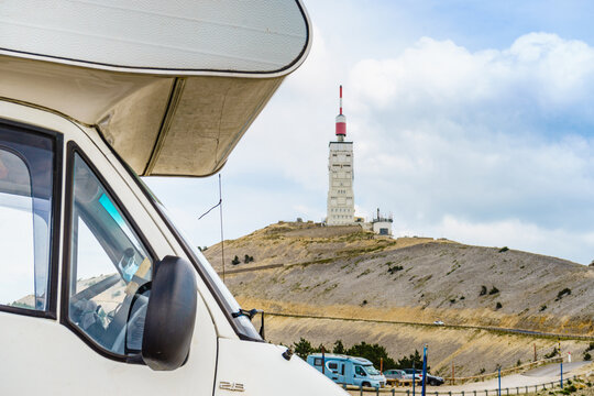 Caravan visiting Mont Ventoux, Provence France. Communications tower and meteorological observatory in the distance