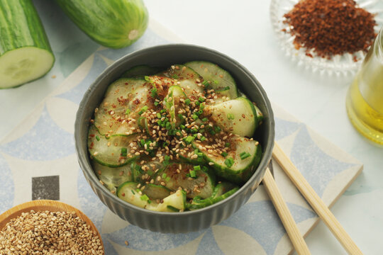 A bowl with Korean cucumber salad Oi Muchim
