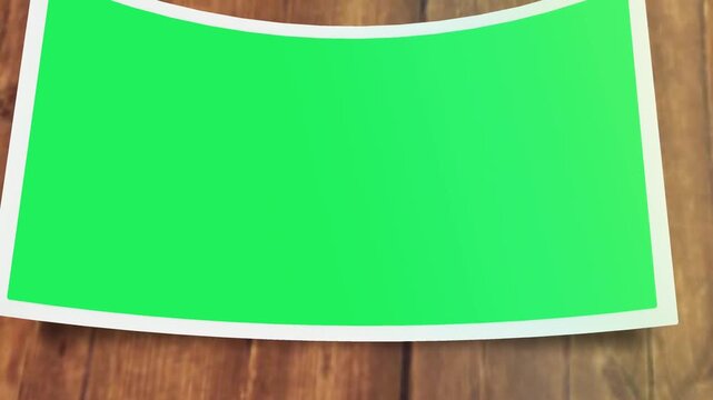 Animation green picture frame on wood floor.