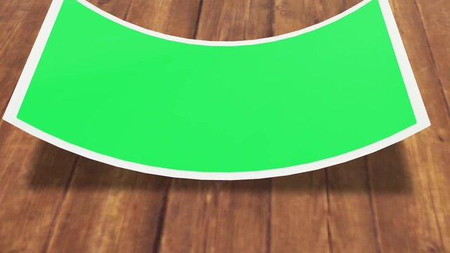 Animation green picture frame on wood floor.