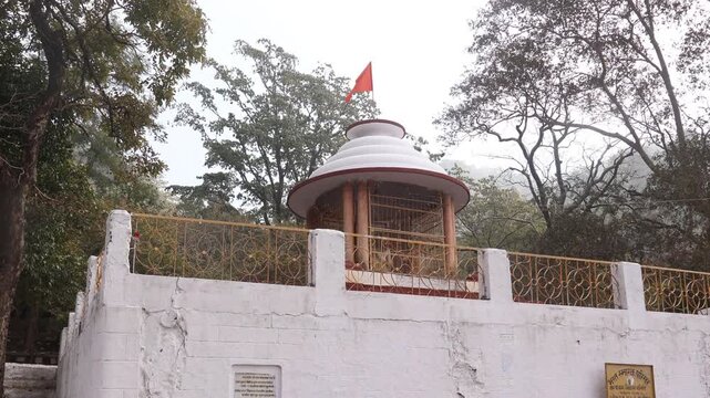 Raw 4K footage of Kanvashram temple in Kotdwara Uttarakhand, a sacred spiritual site linked to Rishi Kanva and Bharat, surrounded by forest and peaceful environment.